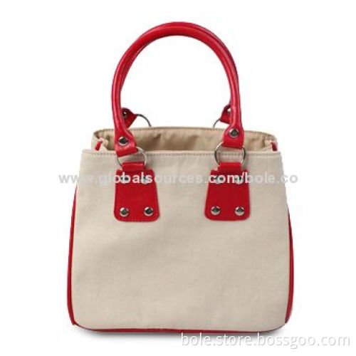 Canvas Handbag, Nicely Designed with Red PU Handle, Piping, OEM/ODM Orders Available